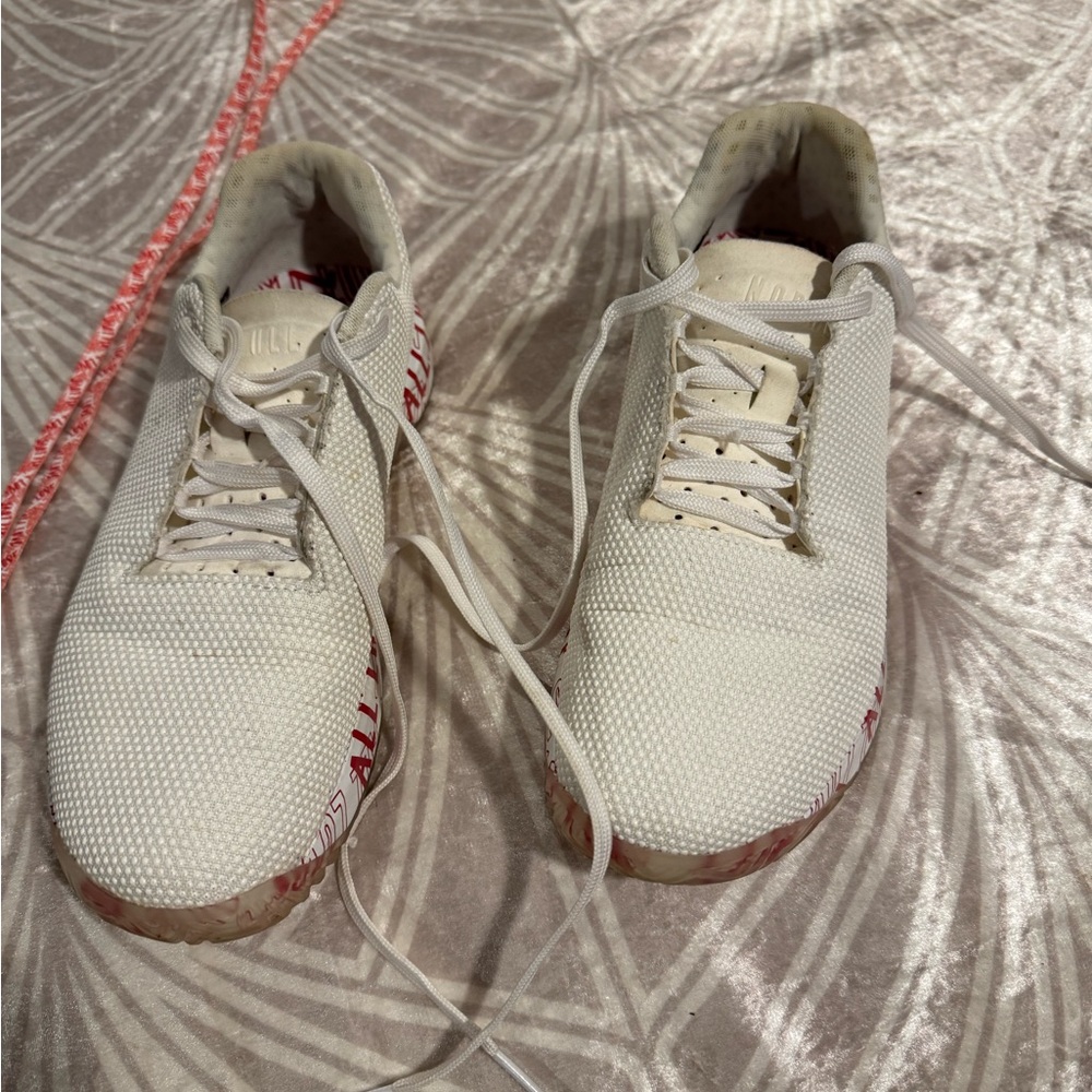 No Bull size 10W 8M. White with all love sole.  Slightly worn. Never outside.